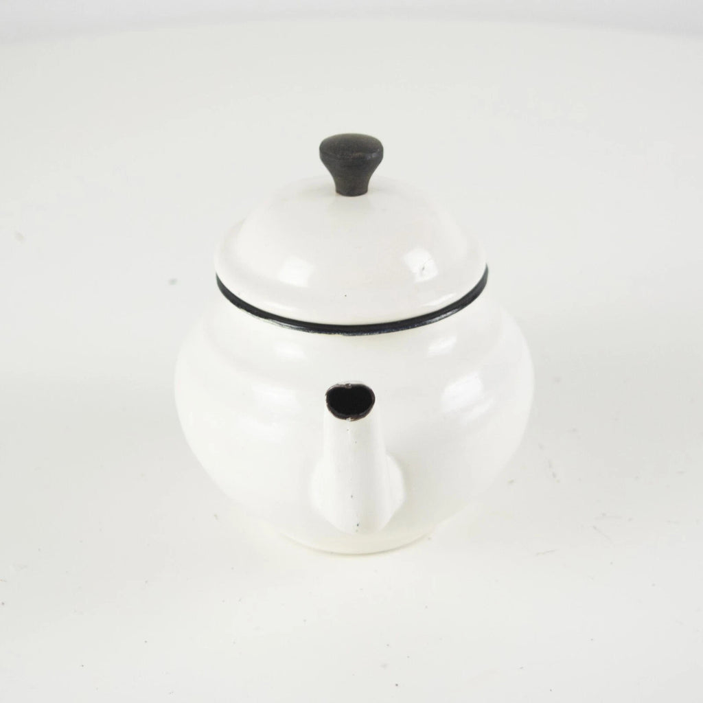 Vintage small white enamelware teapot. Vintage white enamel kettle pot