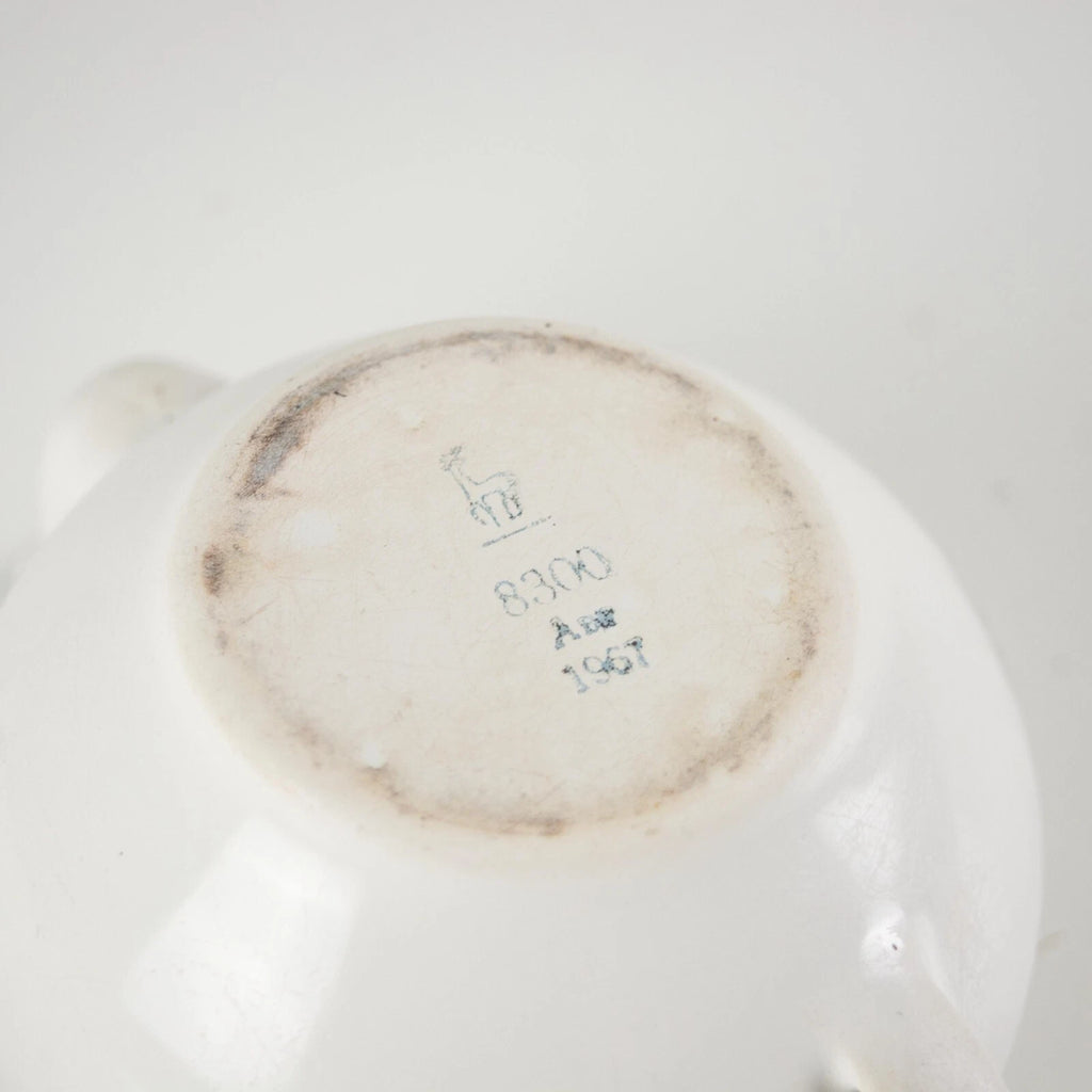 Vintage small white enamelware teapot. Vintage white enamel kettle pot