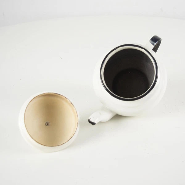 Vintage small white enamelware teapot. Vintage white enamel kettle pot