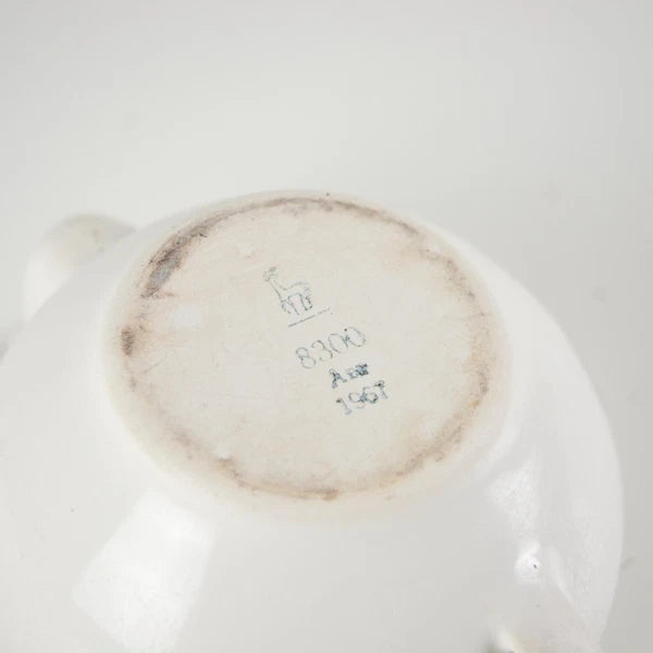 Vintage small white enamelware teapot. Vintage white enamel kettle pot