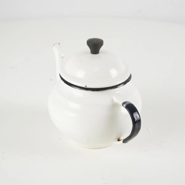 Vintage small white enamelware teapot. Vintage white enamel kettle pot