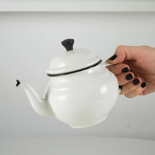 Vintage small white enamelware teapot. Vintage white enamel kettle pot